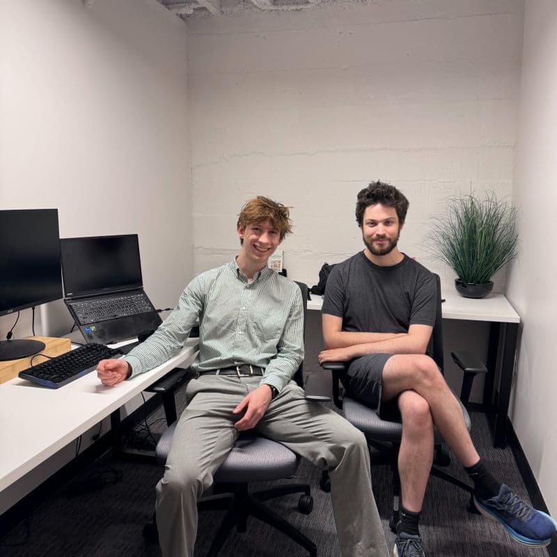 Emmett and Logan in the basement broom closet office