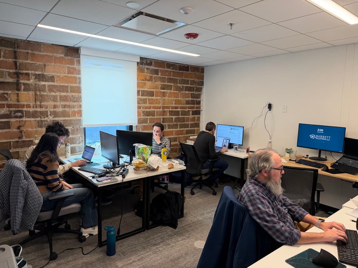 Barrett Solutions team collaborating on software development