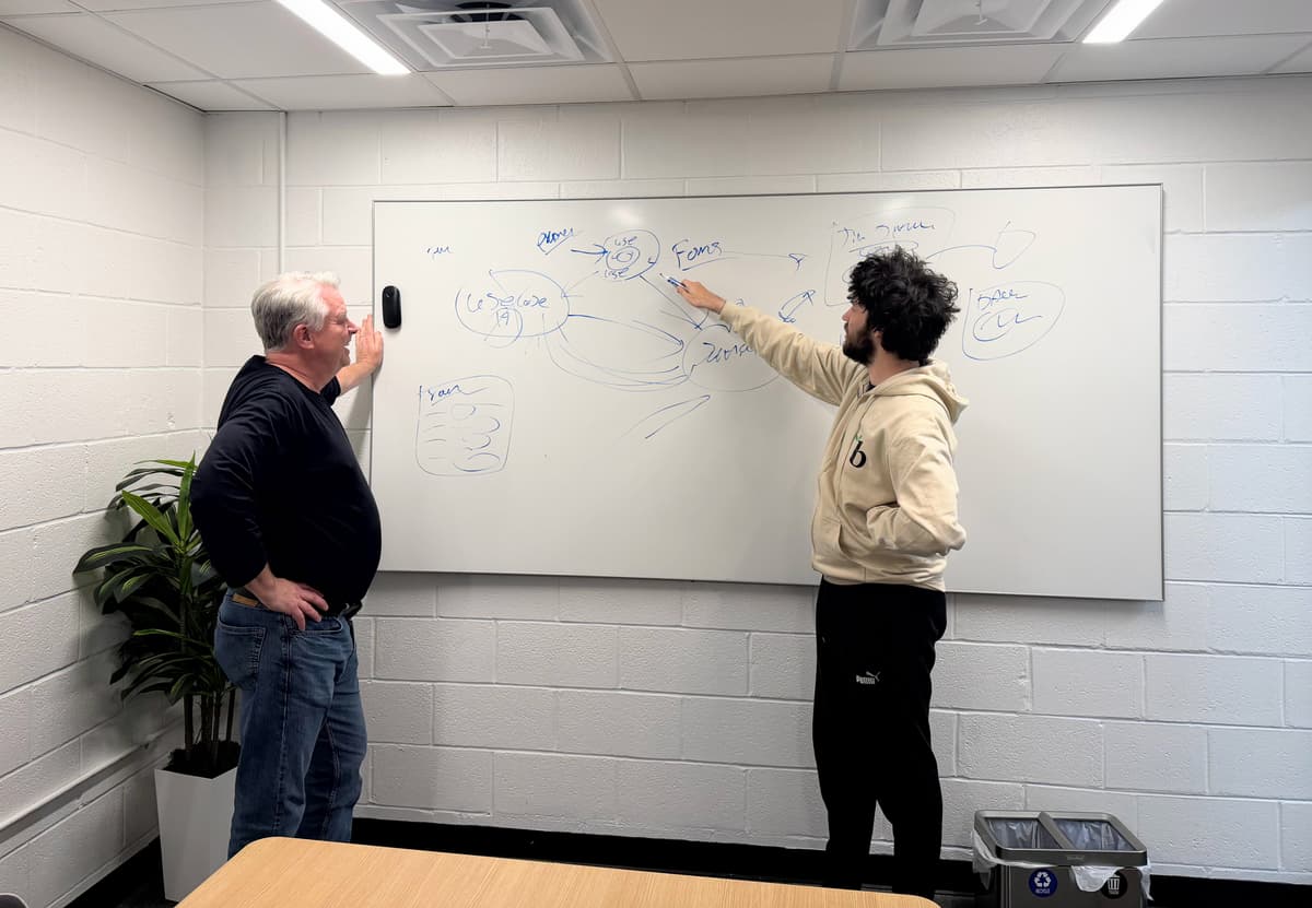 Consulting meeting with client discussing project requirements